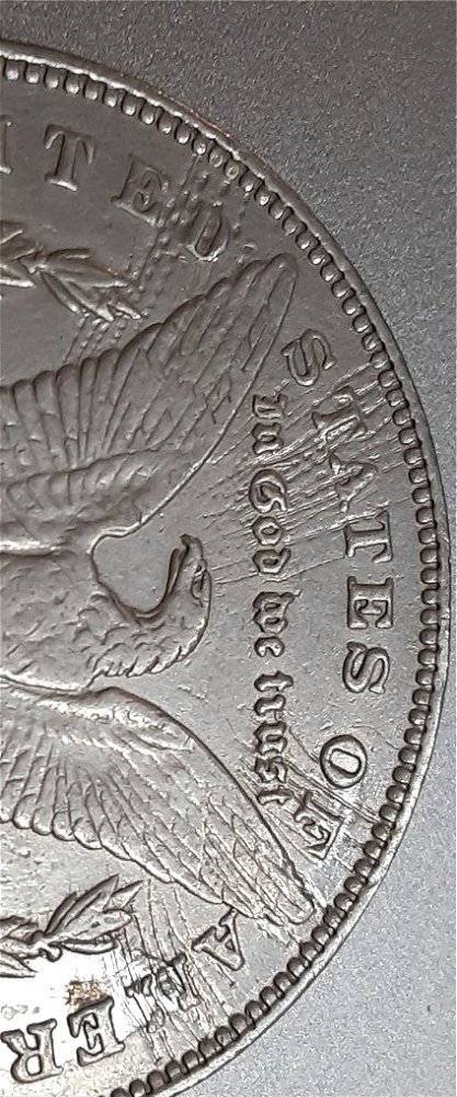 1878-P-Morgan-7-Tf-With-Some-Crazy-Lines-On-Back-Of-Coin?-Not-Scratched