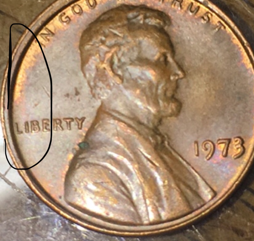 High-Rim-On-One-Side-Of-This-1973-Penny....