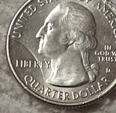 2018-Quarter-Struck-Through-Large-Rim-Burr