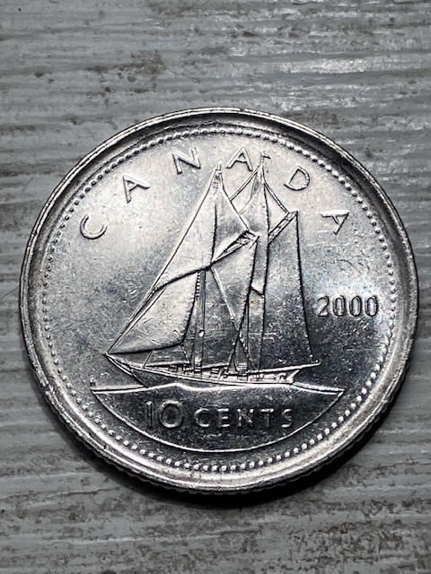 Strange-Rim-On-2000-Dime