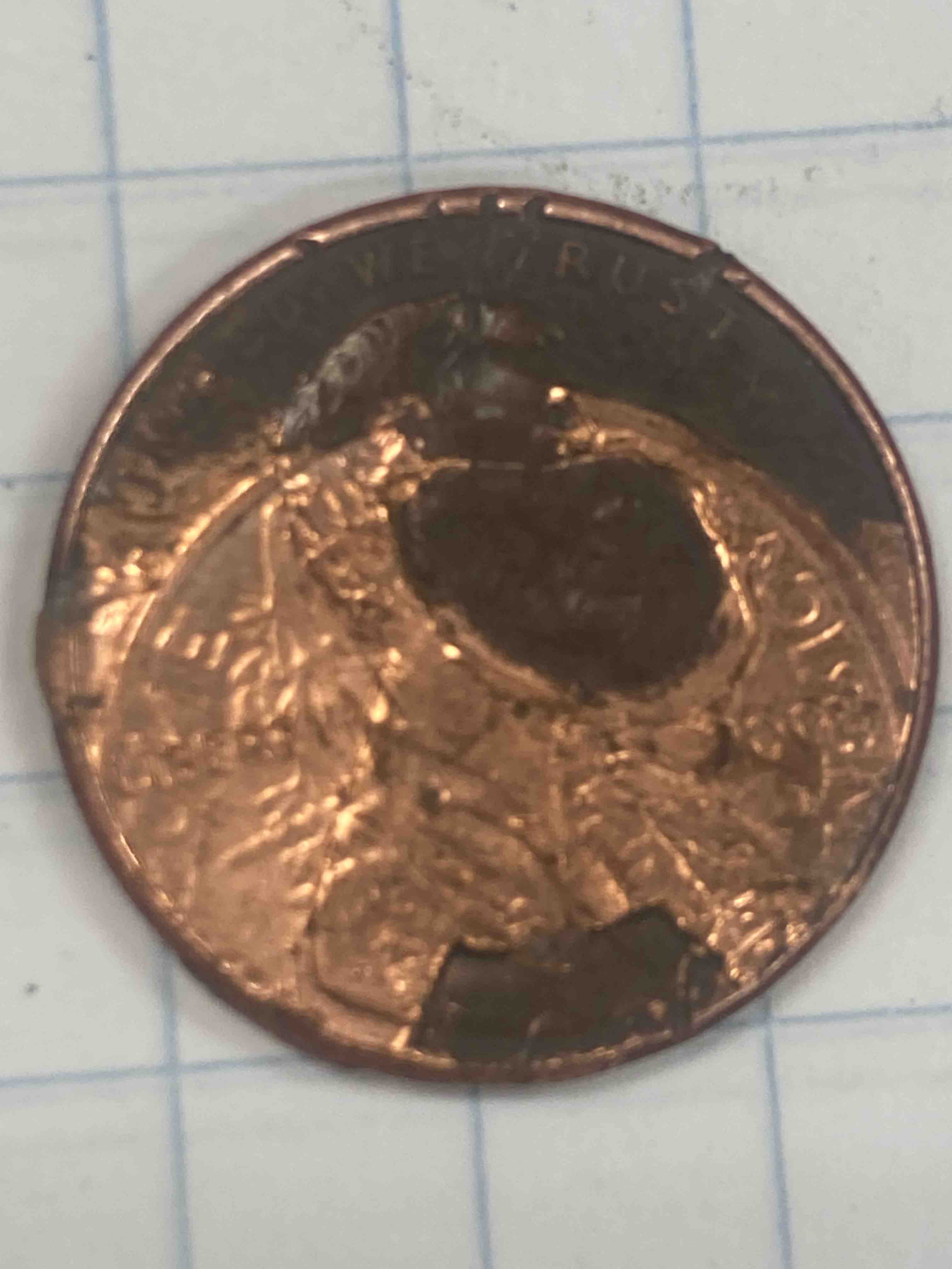Crazy-Penny,-Imprint-Of-A-Dime.-You-Can-See-The-Ear.