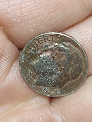 This-Dime-Is-Copper-Color-Is-This-A-Error-Coin-Or-Just-Damaged-1980-D