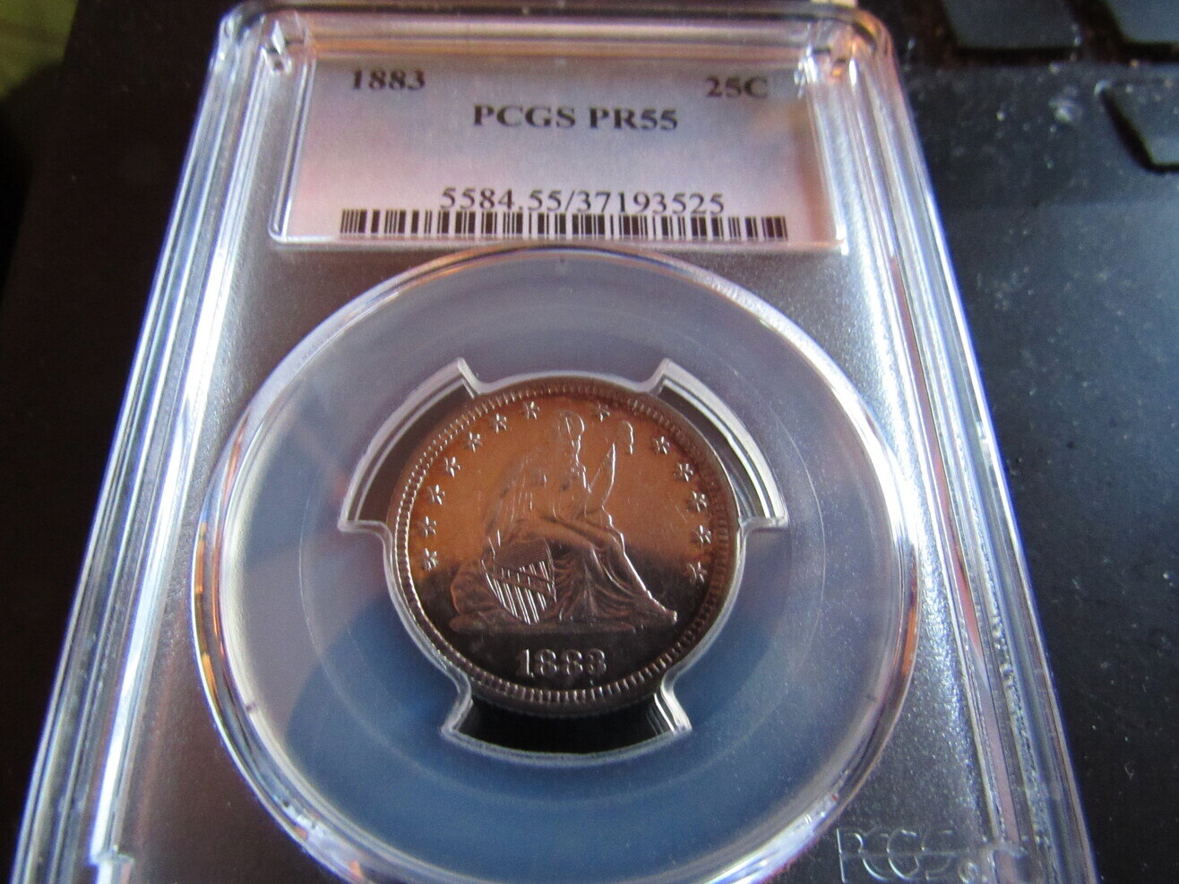 1883-PF-55-Seated-Liberty-Quarter
