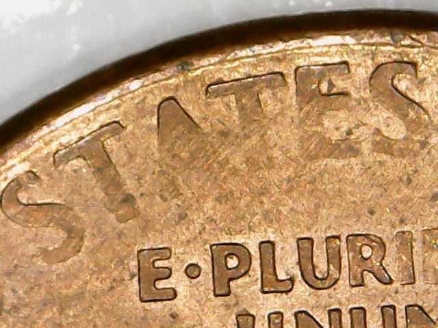 Cent:-Ghost-Letters-Or-Struck-Through-Grease?
