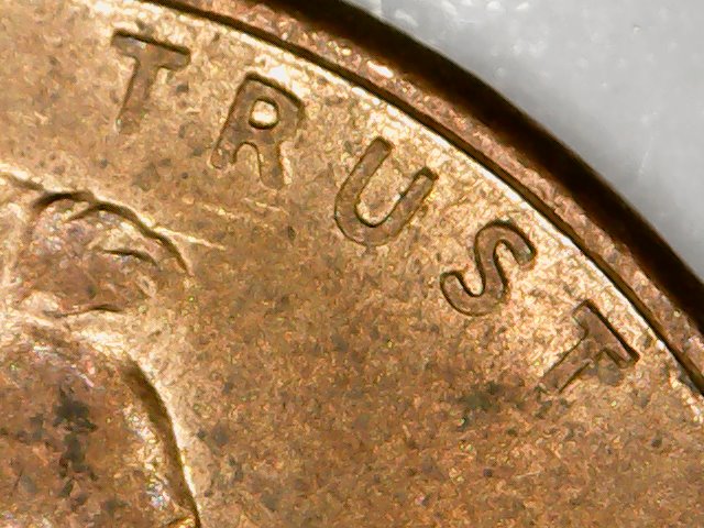 Cent:-Ghost-Letters-Or-Struck-Through-Grease?