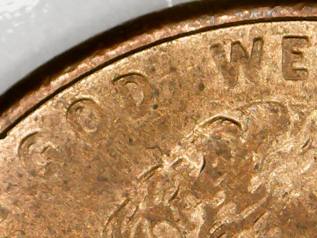 Cent:-Ghost-Letters-Or-Struck-Through-Grease?