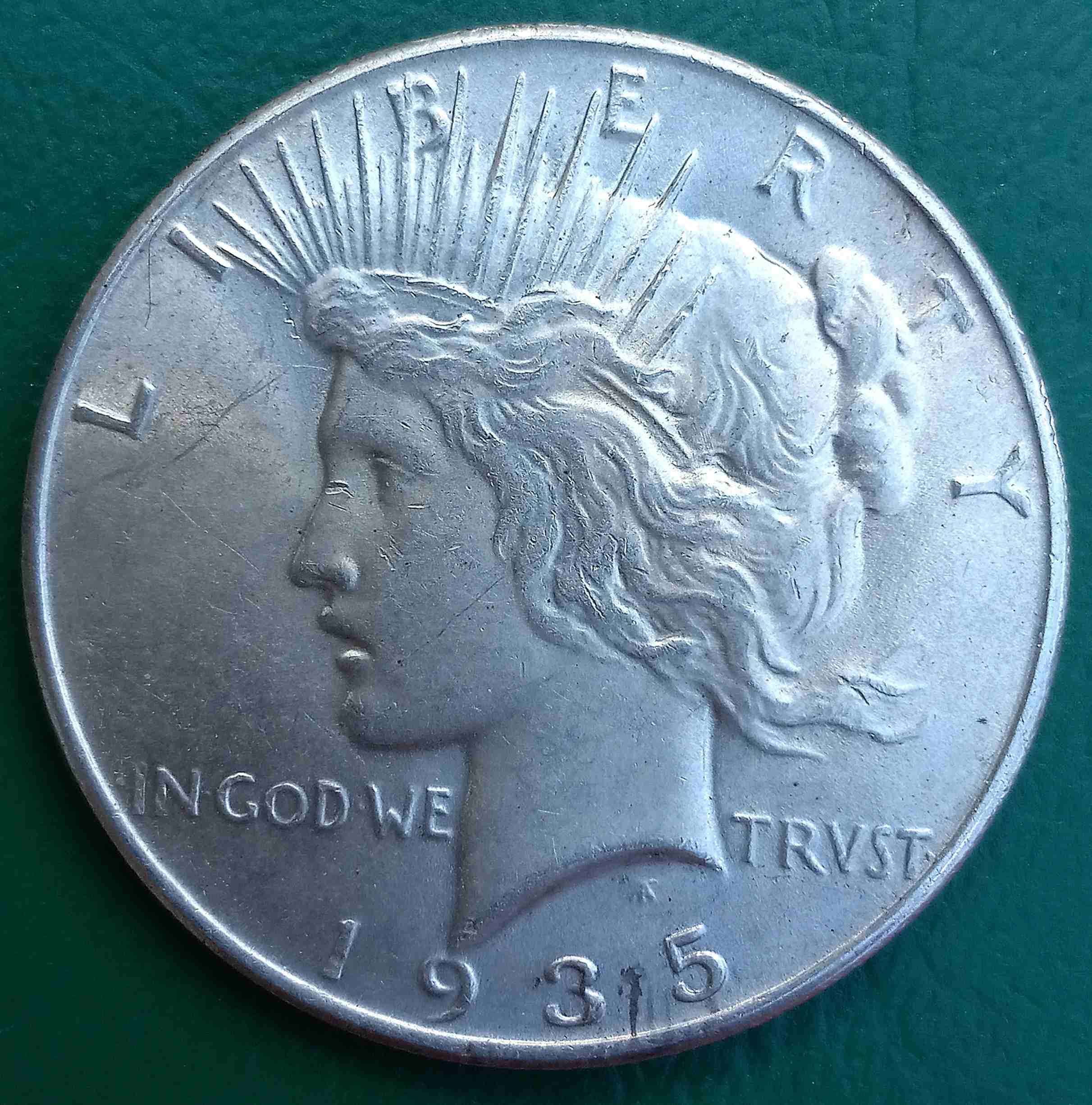 1935-Peace-Dollar-Grade