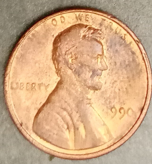 1990?-Penny-Appears-To-Be-Struck-Through-Grease?