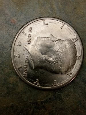 Found-A-1971-D-Half-Dollar-With-Marks-In-Between-Lettering-And-The-Date?