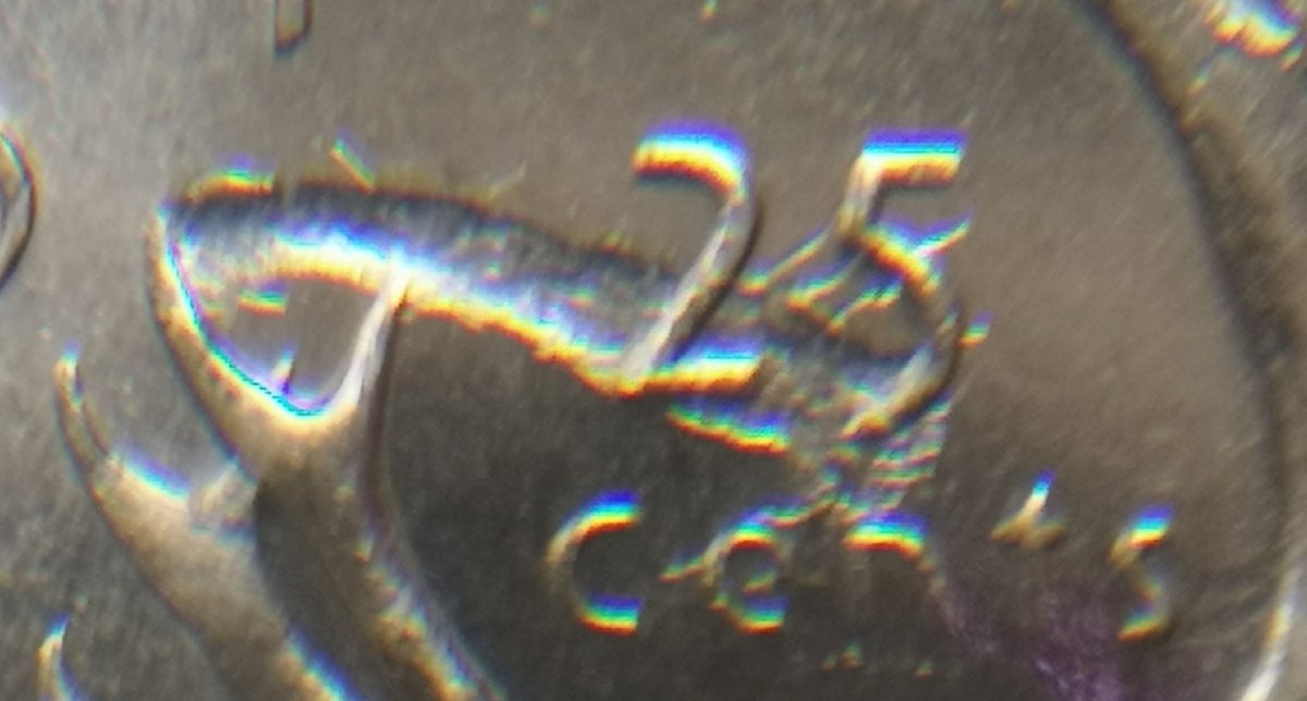 1975-25-Cents-Struck-Through-Wire?