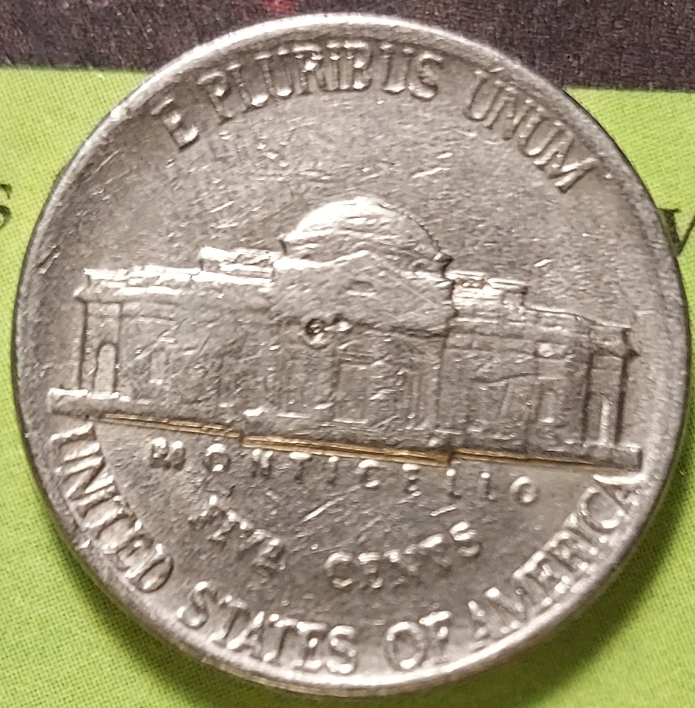 1986-D-Nickel-With-3-Perfect-Circles.-I'm�aware-Its-Probably-Just-Damage