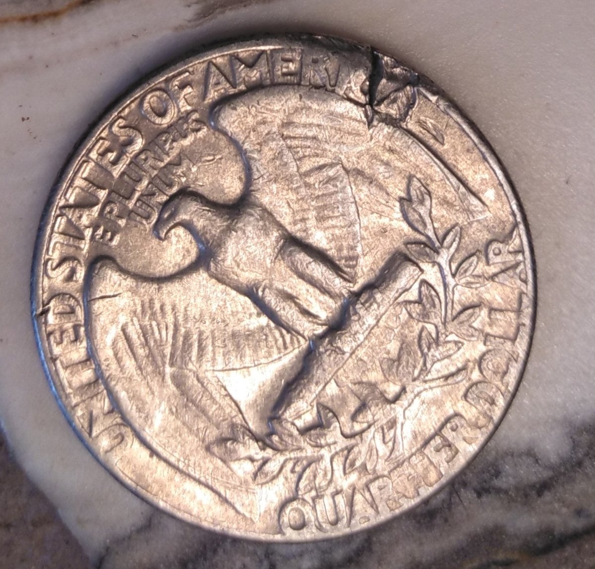 Quarter-Damage-Or-Die-Crack-From-Mint