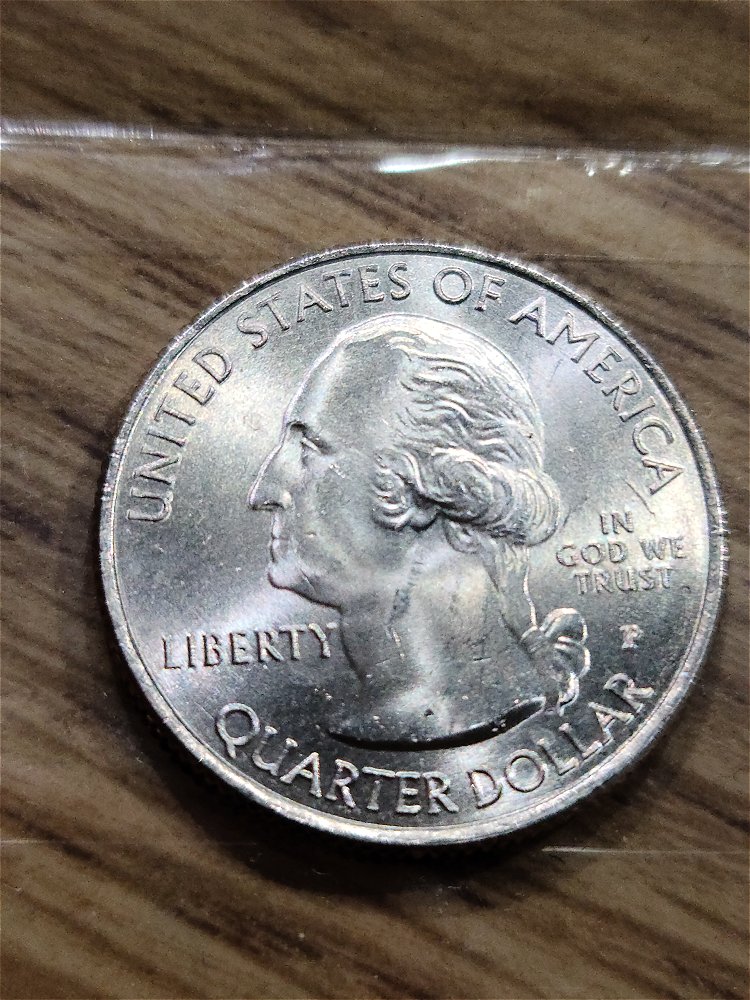 Two-2021-P-Tuskegee-Airmen-Quarter-Struck-Through