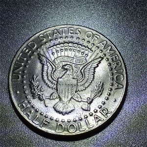 Choking-Eagle-And-Die-Chip-Or-Star-On-Half-Dollar?