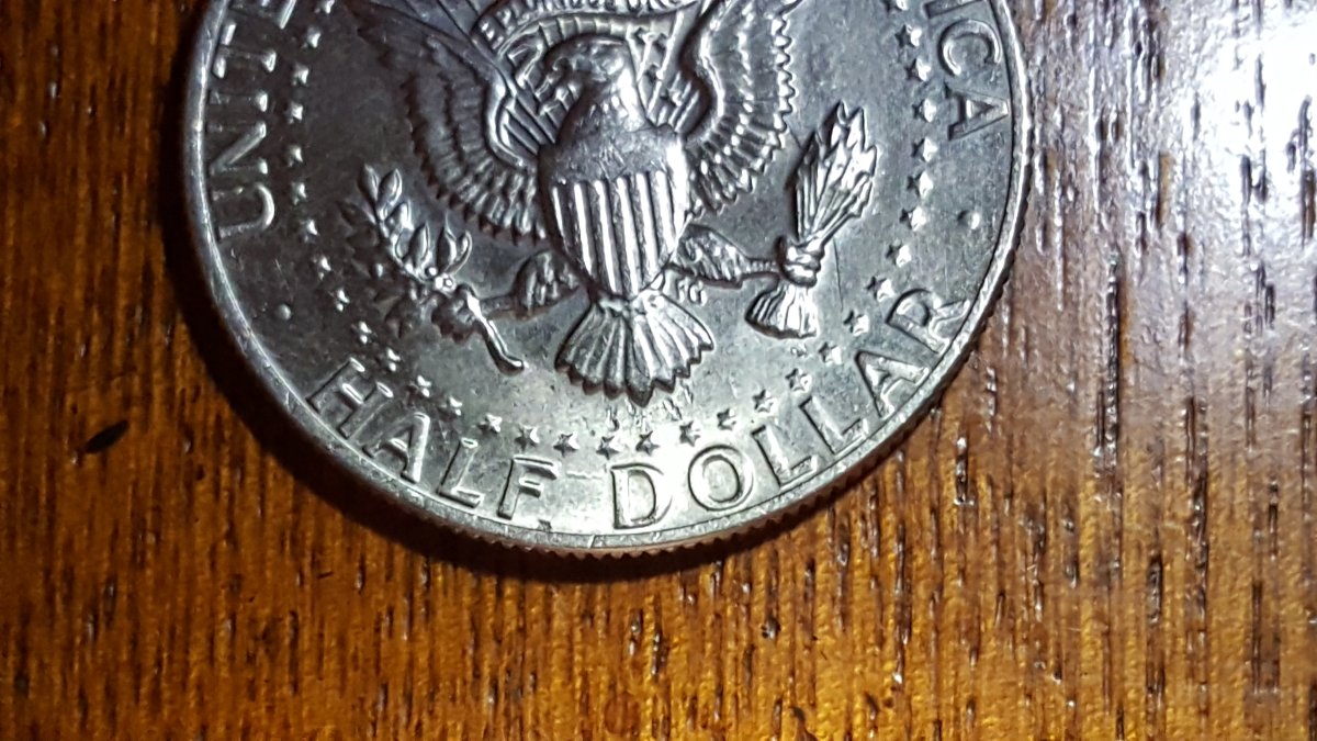 1983-JFK-1/2-With-What-Looks-Like-Die-Clash.-Any-Input-Appreciated