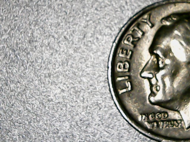 Large-Mole-On-Side-Of-Lip-And-Eye-,-If-Visible.-1989-P-Dime
