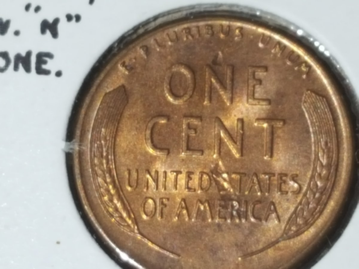 1955-S-LWC-Struck-Through-A-Dropped-Filling-On-Laminated-Die?