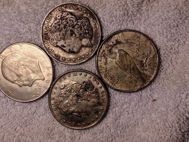 1977-S-Dollar-Silver-One-Legged-Eagle,-Struck-Through-Grease?