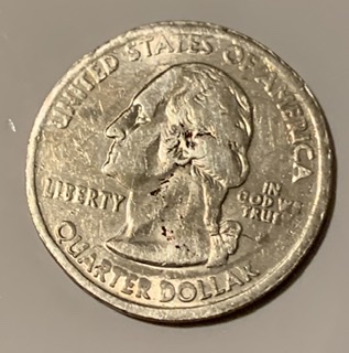 2007-Idaho-State-Quarter-Error-Not-Struck-All-The-Way