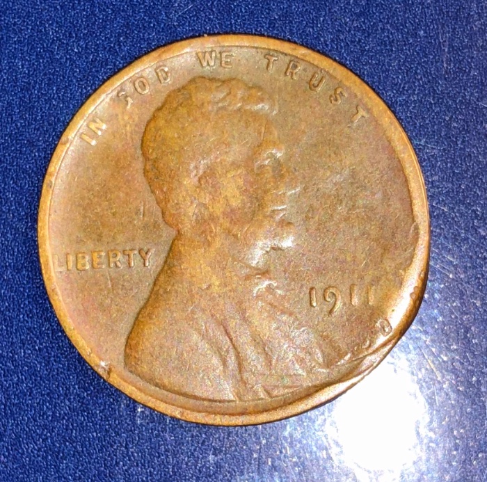 1911-Wheat-Penny-With-Indentation-Of-Another-Penny?