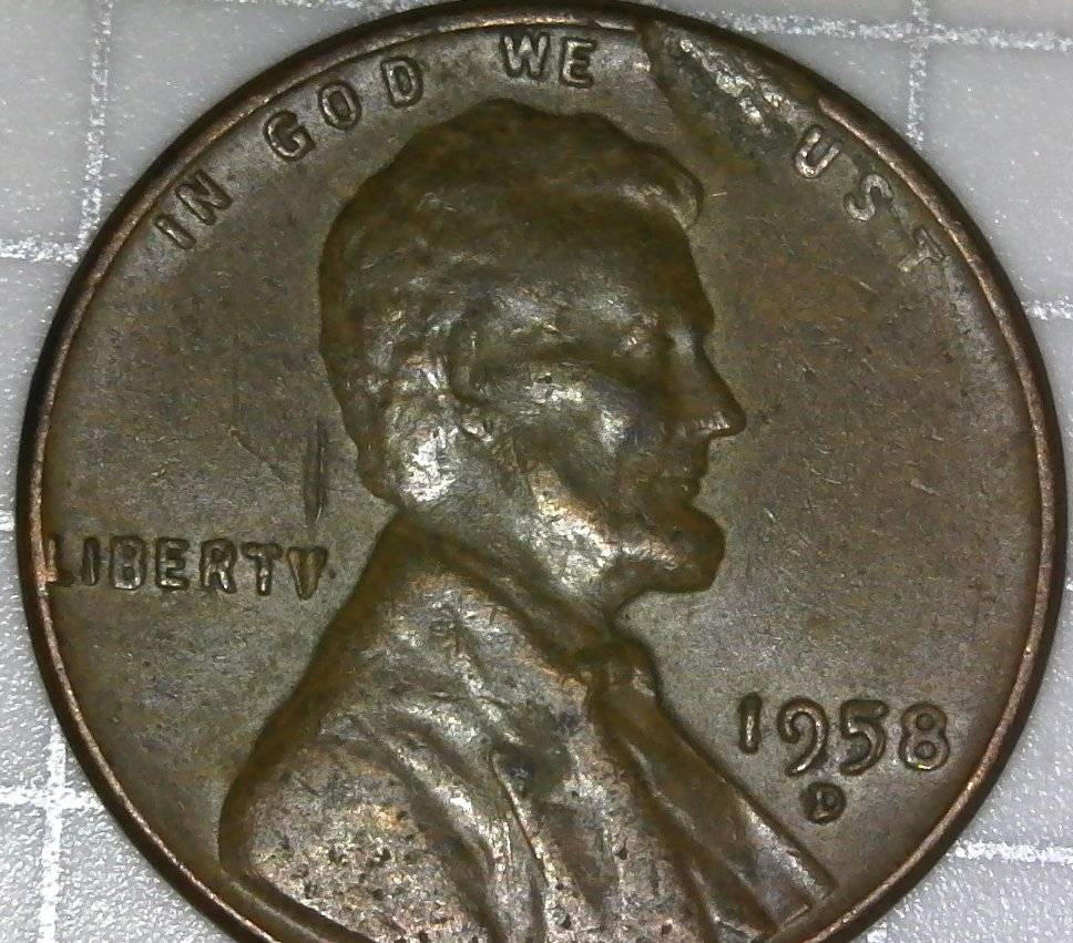 1958-D-LWC-OBV-Struck-Through-Debris