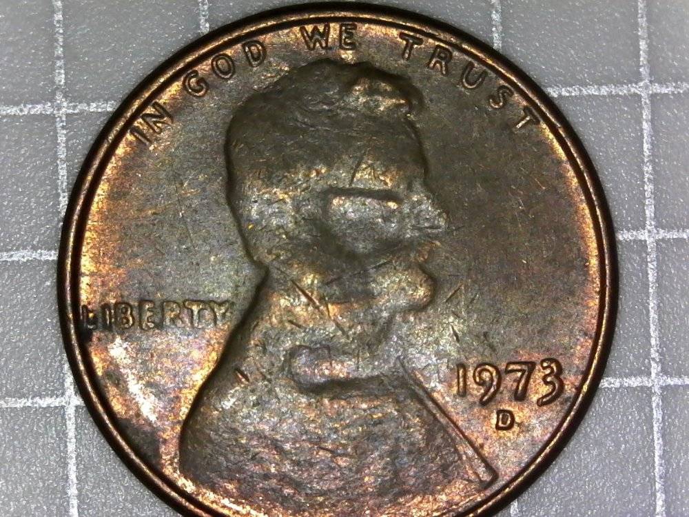 1973-D-Lincoln-Memorial-Cent-Obverse-Strike-Through-Or-PMD?