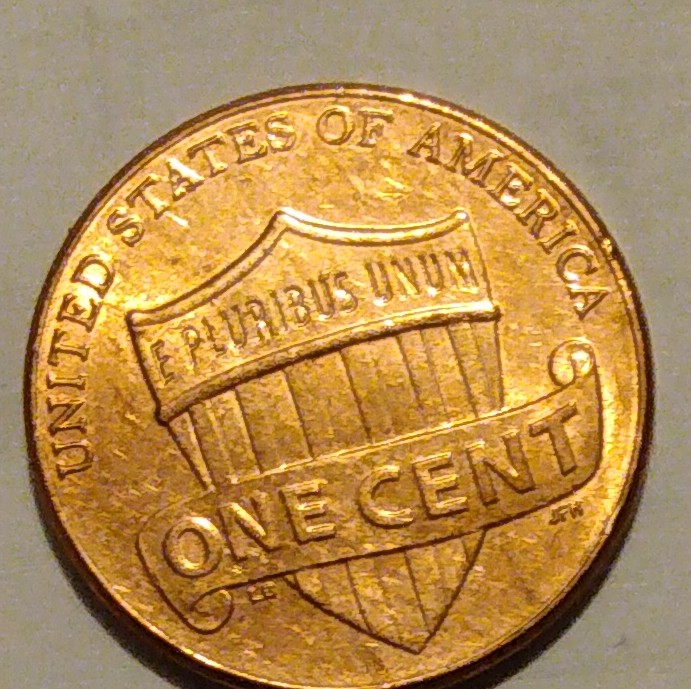Not-Sure-What-Happened-To-This-Penny-But.how-Does-This-Come-Out-Of-A-Bank