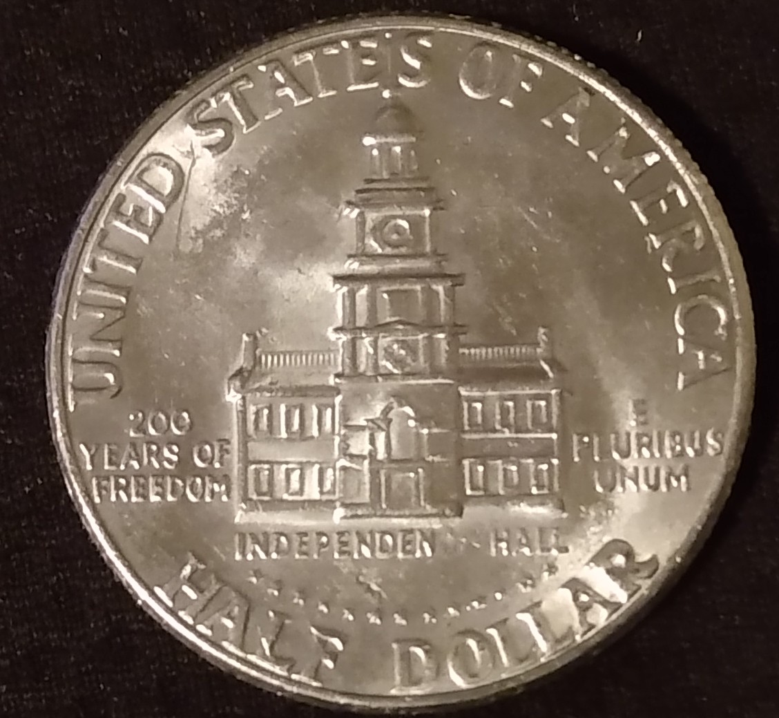 Can't-Tell-If-It-Scuffed-Or-A-Error-1776-1976-Kennedy-Half-Dollar