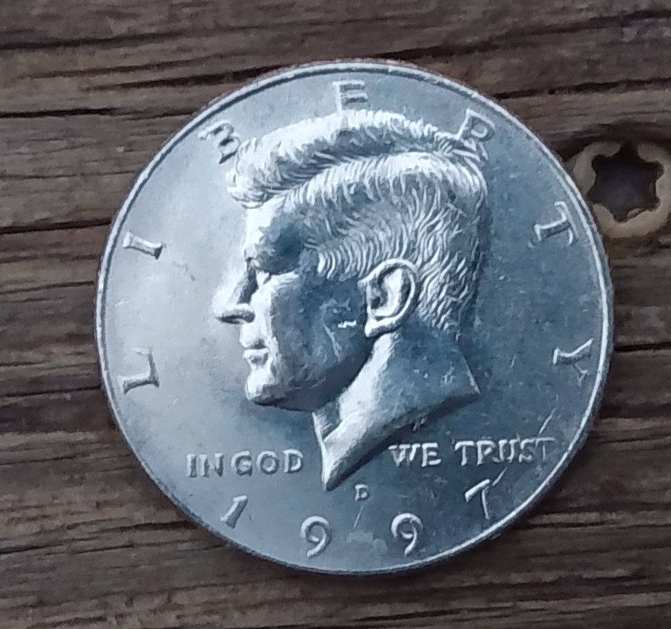 Why-Does-The-Ear-On-This-1997-Kennedy-Half-Dollar-Look-So-Big?