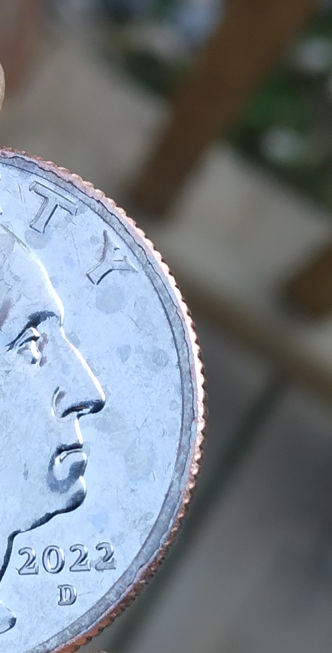 Is-This-2022-D-Quarter-DDO--Plus-Has-A-Little-Copper-Around--Edge-But-Almost-Full-Silver-Band?