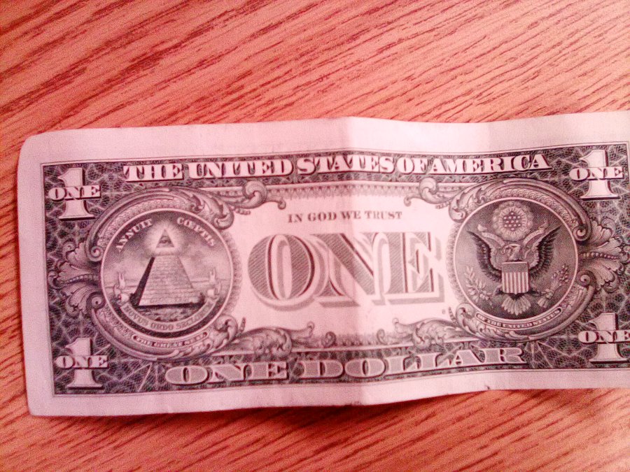 Is-A-$1-Note-That's-Cut-With-More-Space-Along-Top-Worth-More-Than-$1?