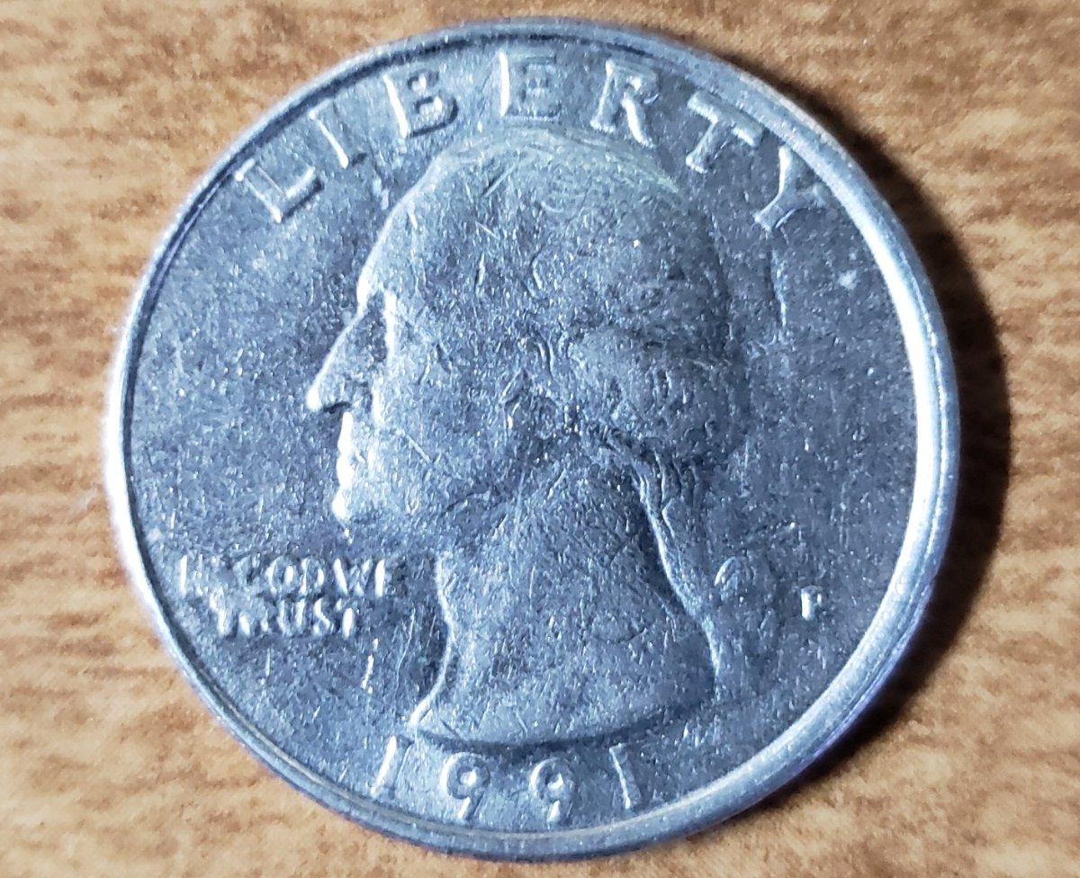 Quarter-1991-P,-Weird-Fused-Lettering.