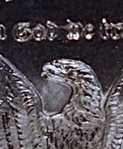 1884-Morgan-Dollar-CC-Major-Error-To-Ear-And-Spitting-Eagle-Bu/Unc