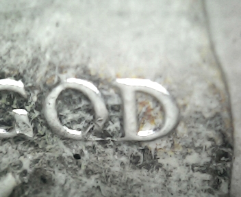 I-Am-Wondering-What-May-Have-Caused-This-Damage?-1964-Kennedy-Half-Dollar
