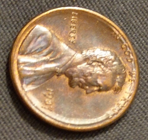 1987-Penny-W/-Strange-Rim-Through-