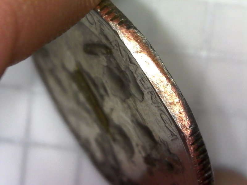 2012-Quarter-With-Damage-And-Or-Massive-Strike-Through