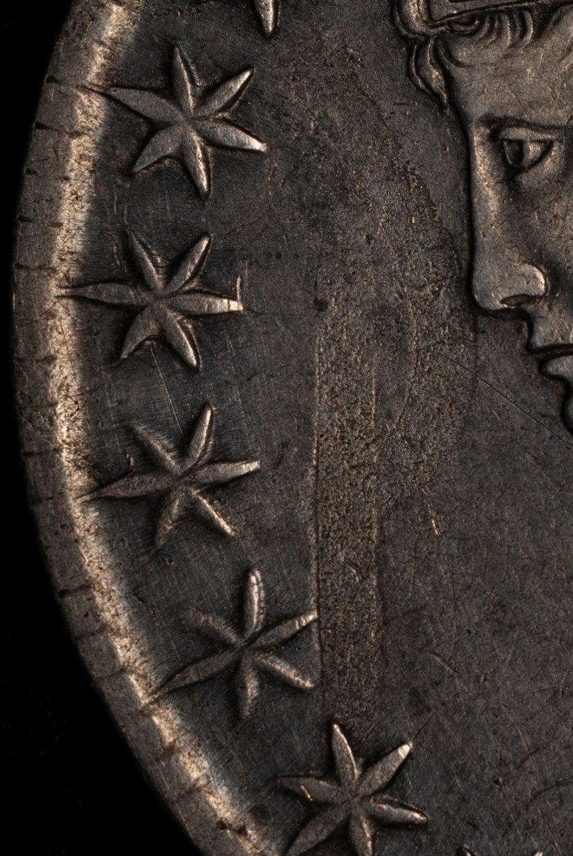 1818-Capped-Bust-Half-Dollar---Struck-Through-Cloth/Ribbon?