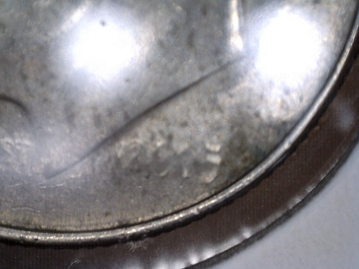 2015-Strike-Through-Dime