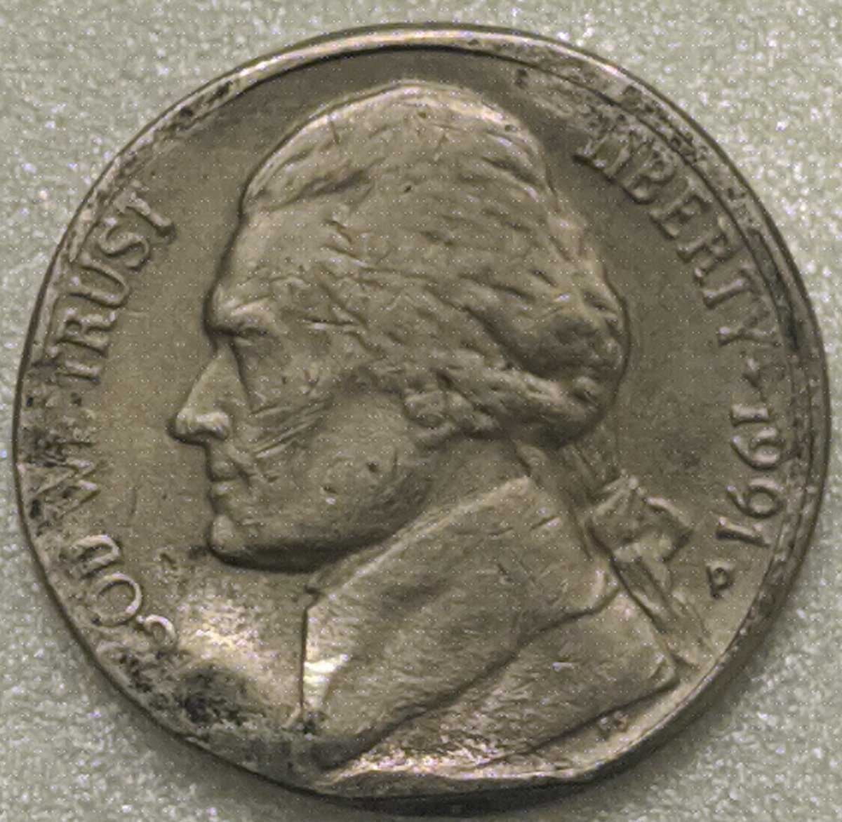 1991-P-Jefferson-Nickel-Damage-Or-Error?