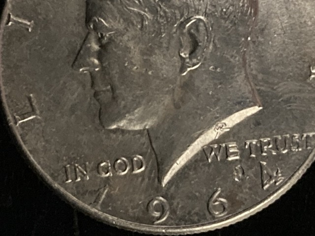 1964-Kennedy-Half-Hole-Lust