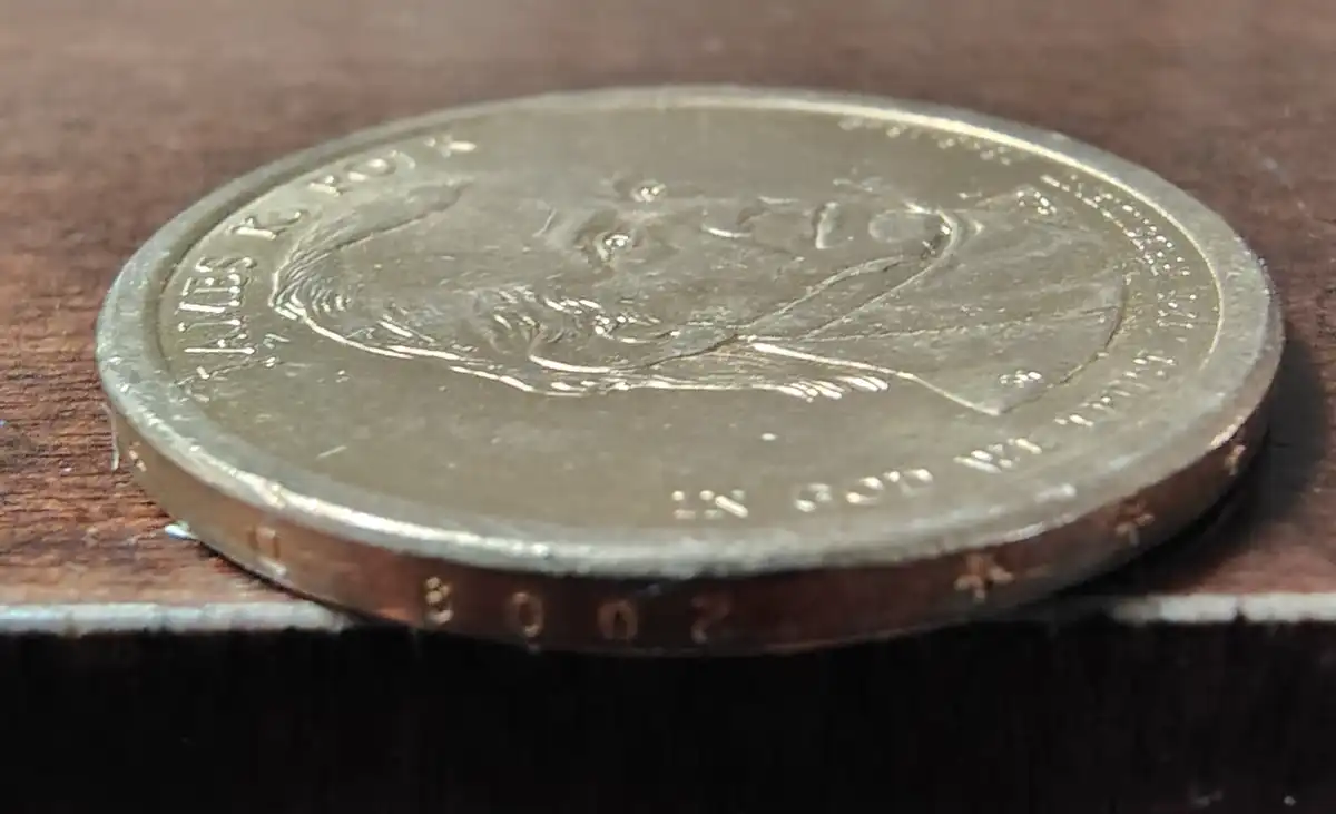 Inscription-On-Edge-Of-Presidential-$1-Coin-Is-Upside-Down