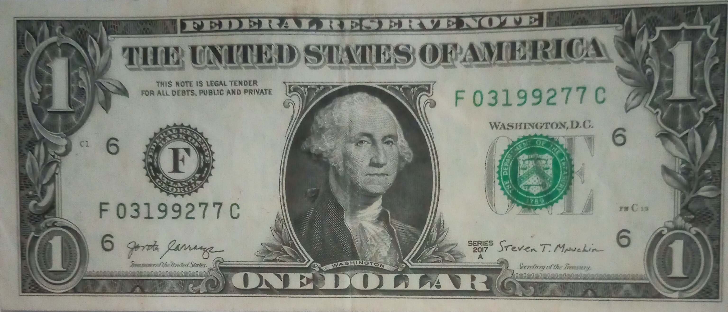 2017A-$1-Bill-With-One-Black-Serial-Number-And-One-Green-Serial-Number.