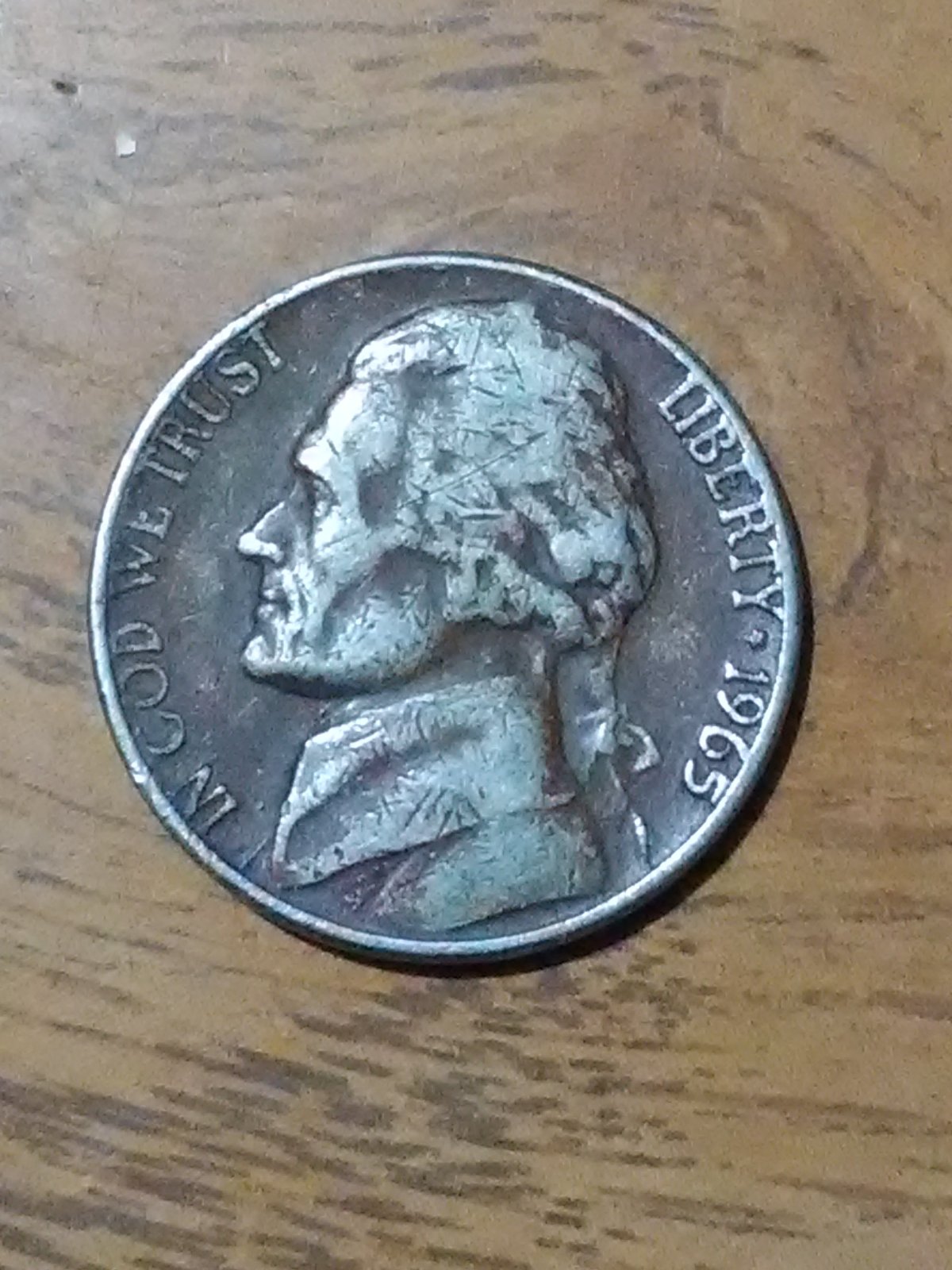 1965-Philadelphia-Nickel,-Unsure-If-Planchet-Error-Or-Possible-Black-Beauty.