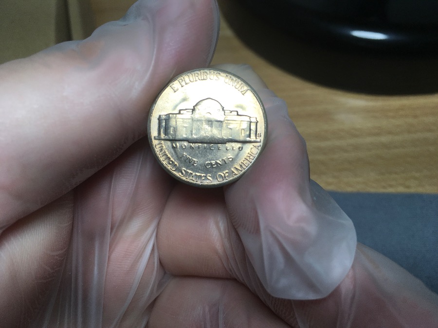 Does-This-Original-Bank-Roll-Of-Nickels-Look-Unopened/Legitimate?