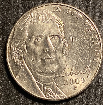 2009-P-Nickel-That-Has-A-Little-Bit-Of-Cud-Ding-On-The-O+r