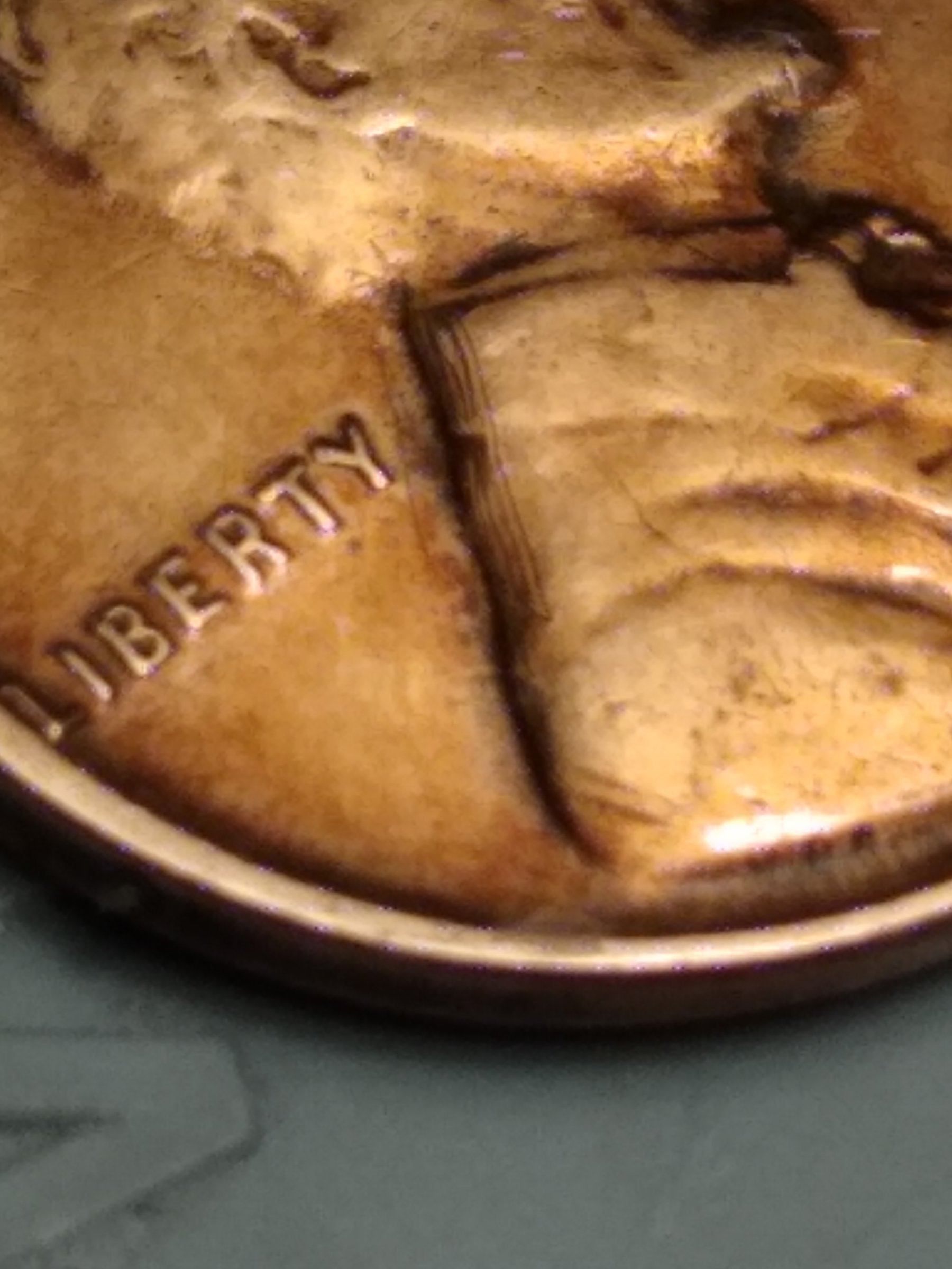 Odd-Marks-On-Lincoln's-Shoulder-On-A-1946-Wheat-Penny