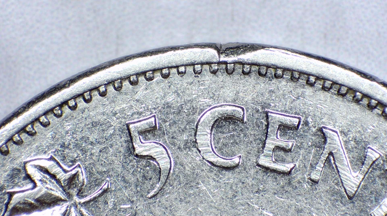 1977-5-Cent,-Strange-Rim-Anomalies..-PMD-Or-Something-Else?