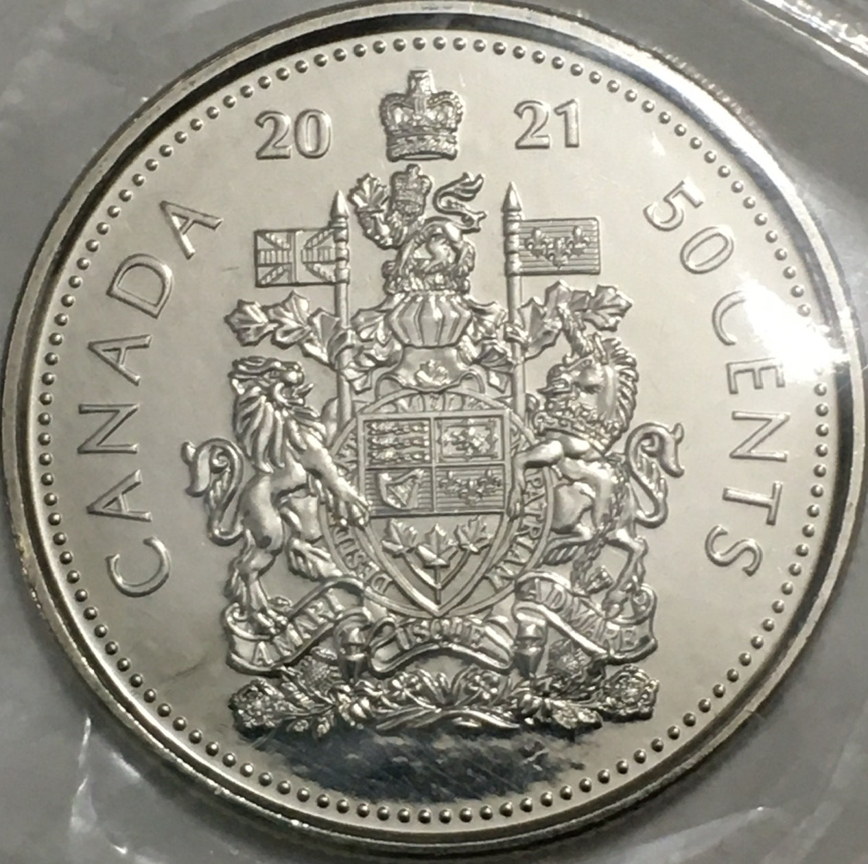 2021-50-Cents-Queen-Version,-Obverse-Struck-Through-Retained-Grease?