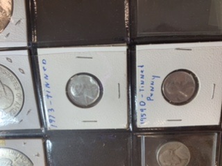 Very-Strange-2-Tin-Pennies!