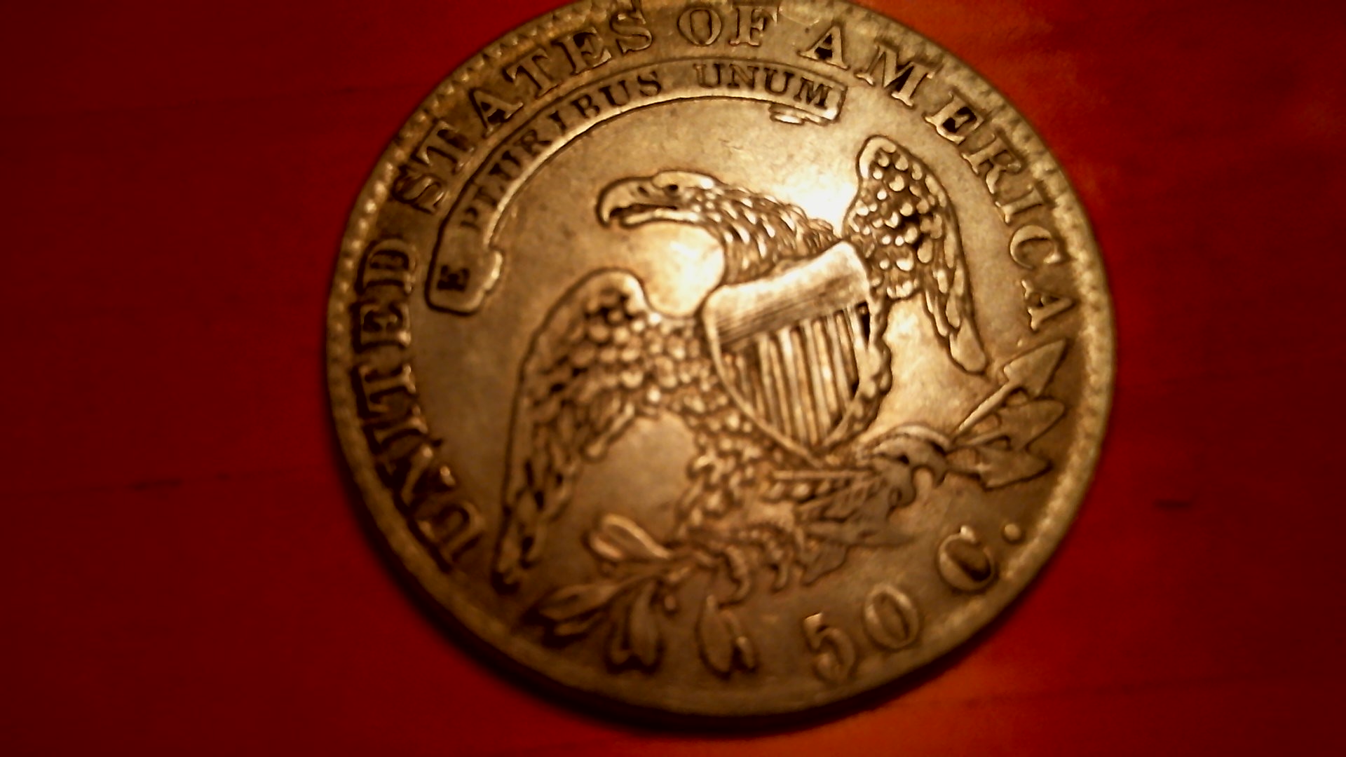 1873-Seated-Half-1832-Capped-Bust-Half